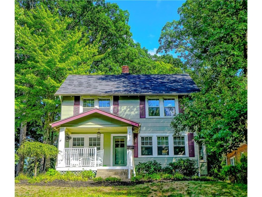 Adorable, charming front porch colonial in a park-
