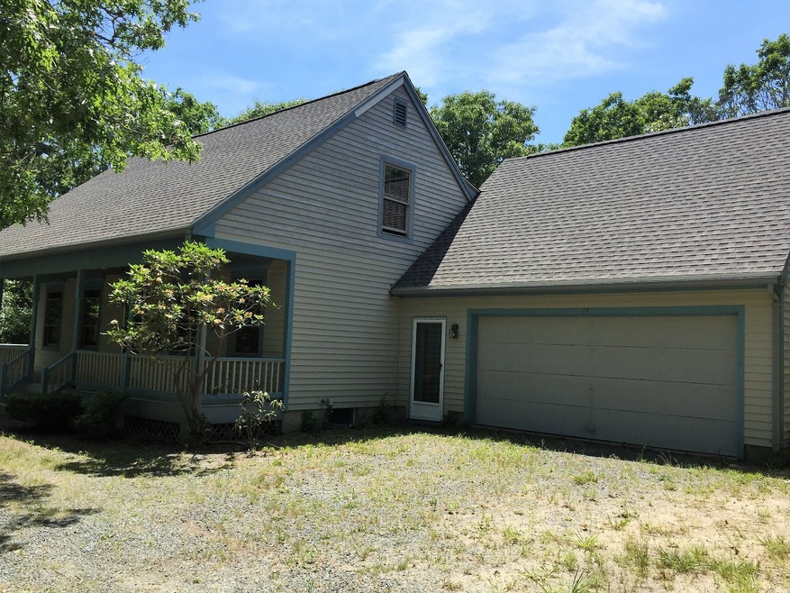 large attached garage w/separate entrance to 4th legal unfinished bedroom above garage