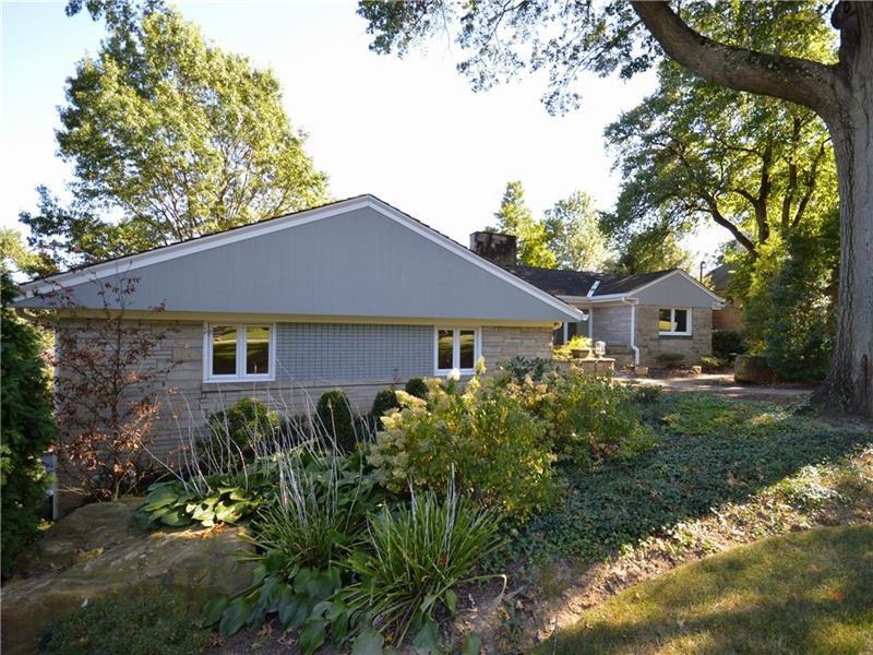 Frank Lloyd Wright inspired multi-level on 1 acre 