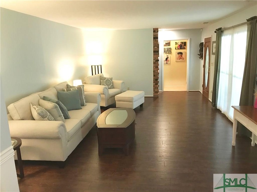 Spacious formal living room with brand new floor.