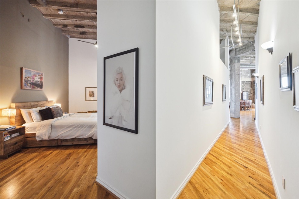 Long gallery entry to open living/kitchen area.  T
