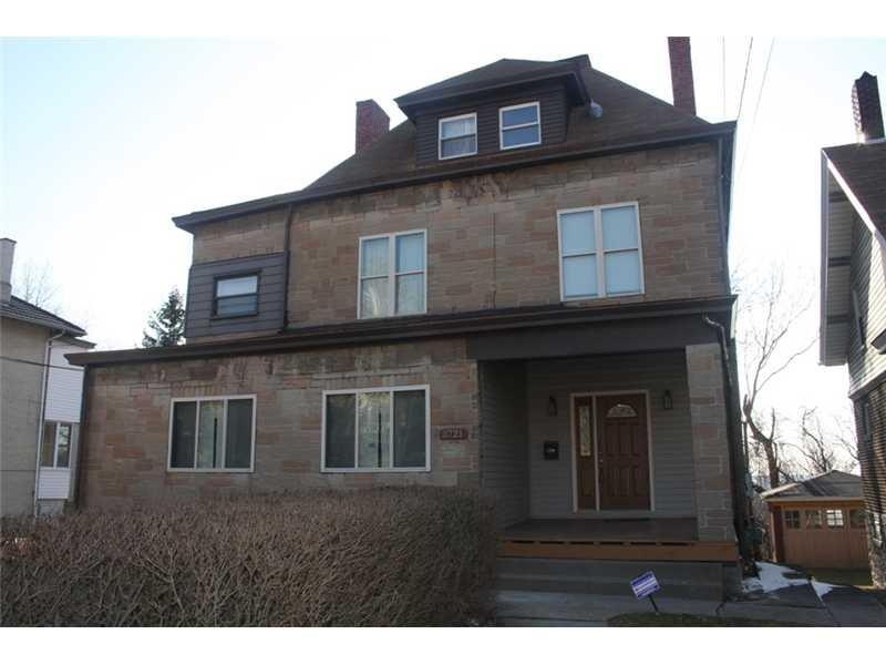 Exterior Front. Stately Stone Home
