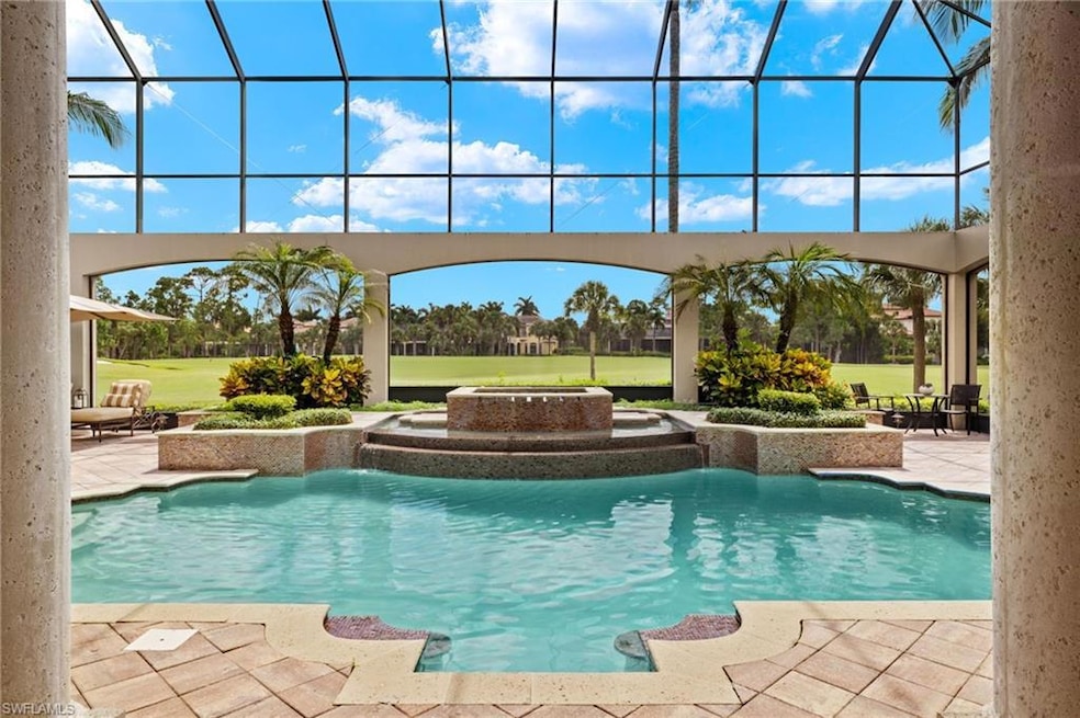 View of swimming pool featuring a lanai