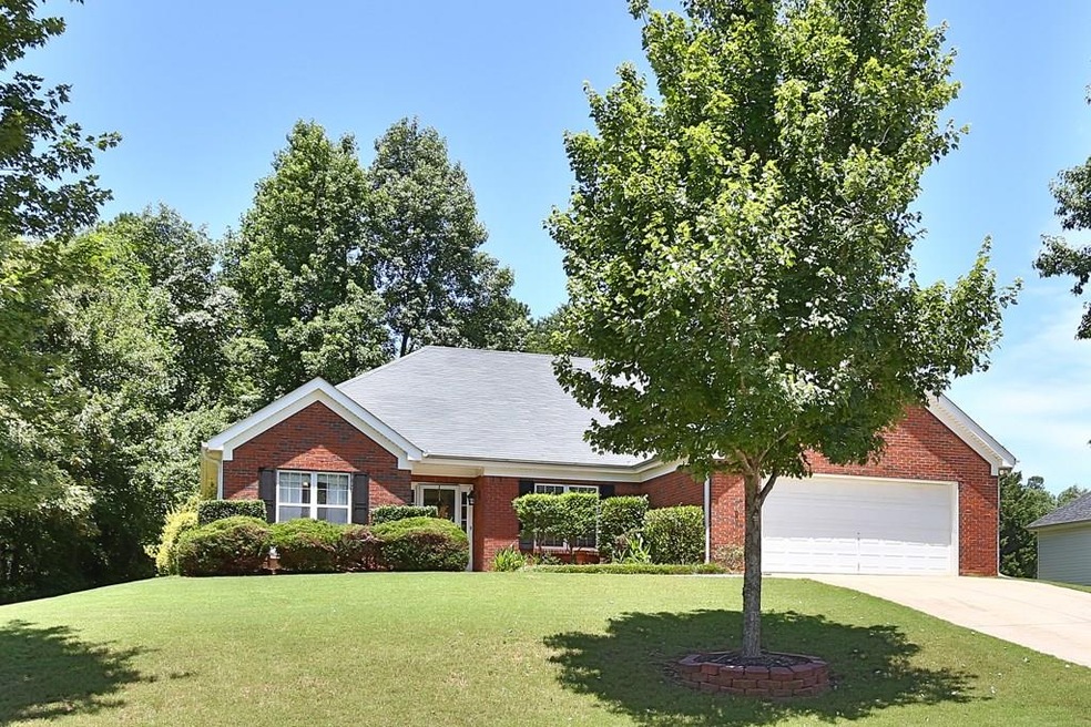 5318 Peach Blossom Trail surrounded by mature tree