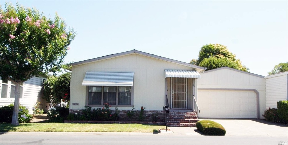 Front of home and attached 2 car garage
