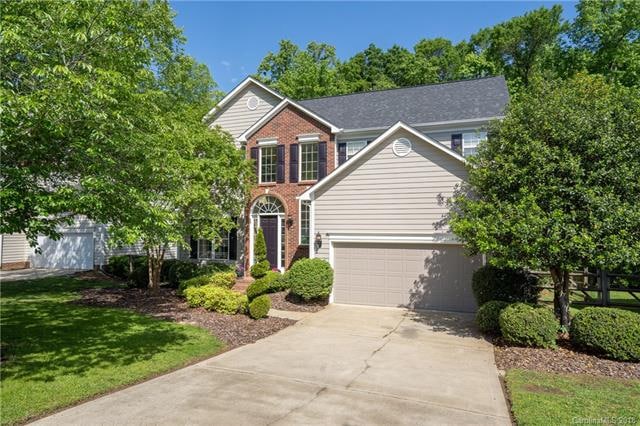 Beautiful professionally landscaped and well maint