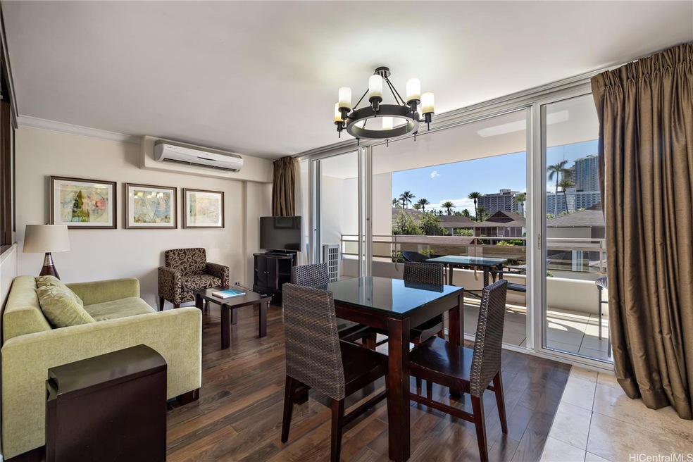 Large floor to ceiling windows welcome guests into