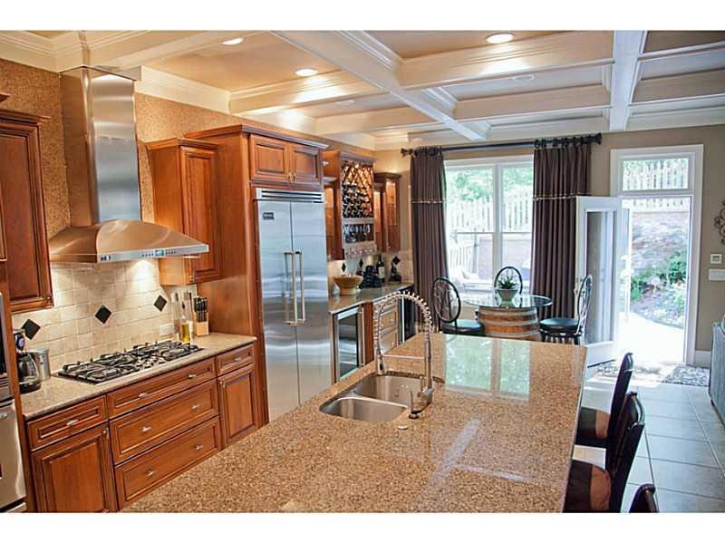 Kitchen. Gleaming tile floor with upgraded cabinet