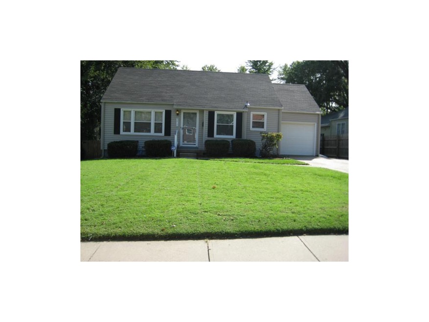 Cute Front Elevation With Manicured Lawn