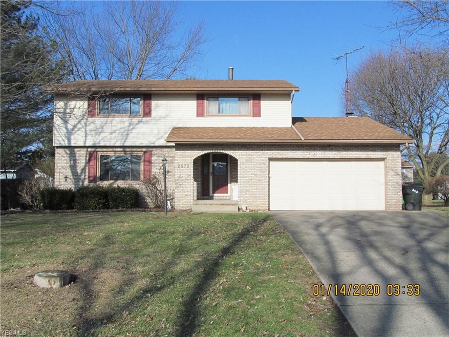 2 Story brick and vinyl home with 2 car garage 4 b
