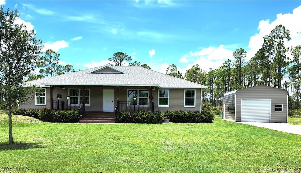Front of Home with Spacious Inviting Porch & Detac