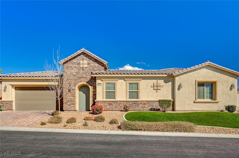 Mediterranean / spanish house featuring a garage,