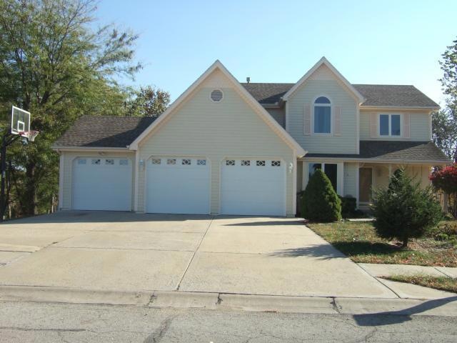 3 car garage and front porch