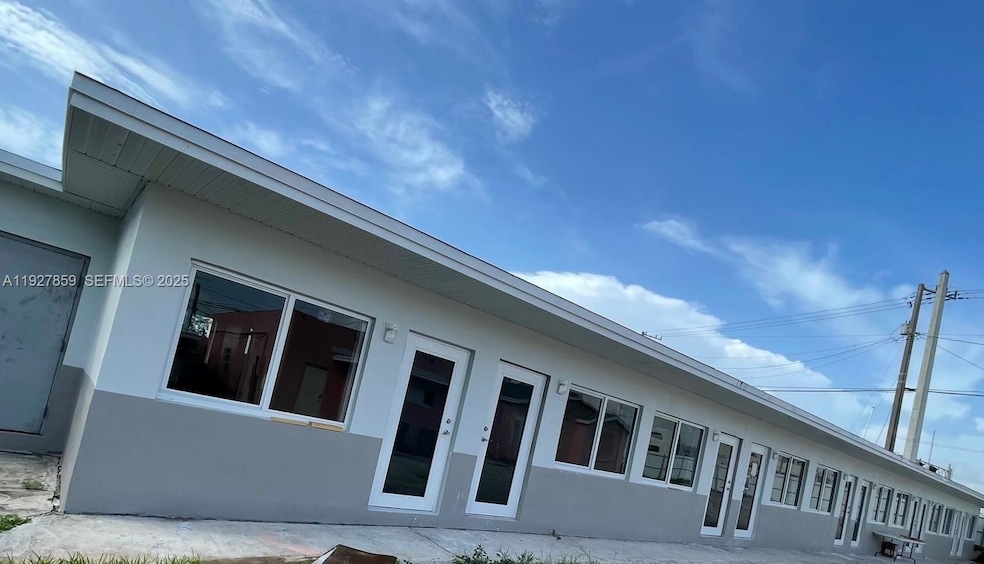 2196 Ali Baba Ave unit 8, Opa-Locka, FL 33054 - photo 1