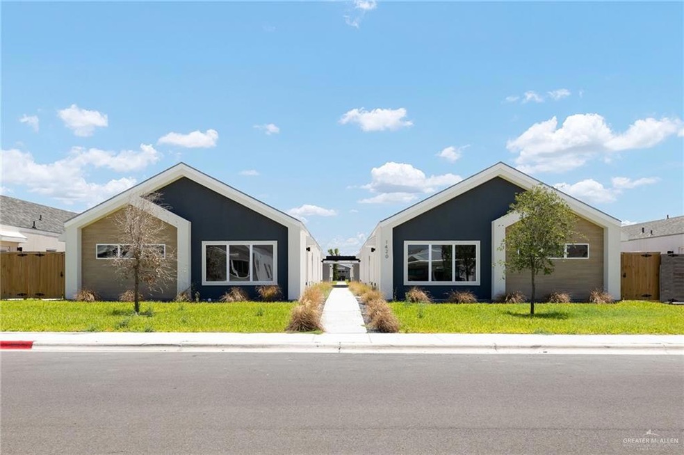 View of front of property featuring stucco siding