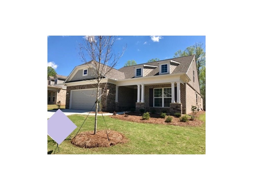 Beautiful front porch and 3 sides brick.