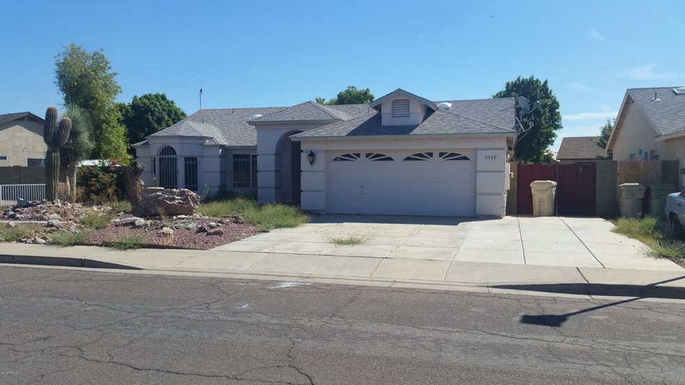 Front -5509 N 76th Dr