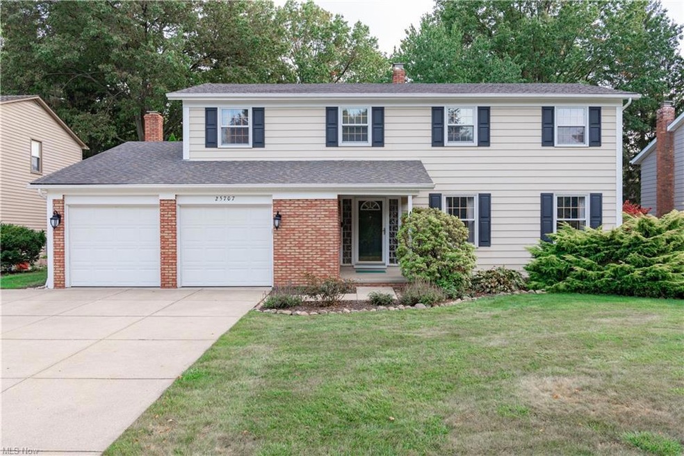 View of front of property with a garage and a fron