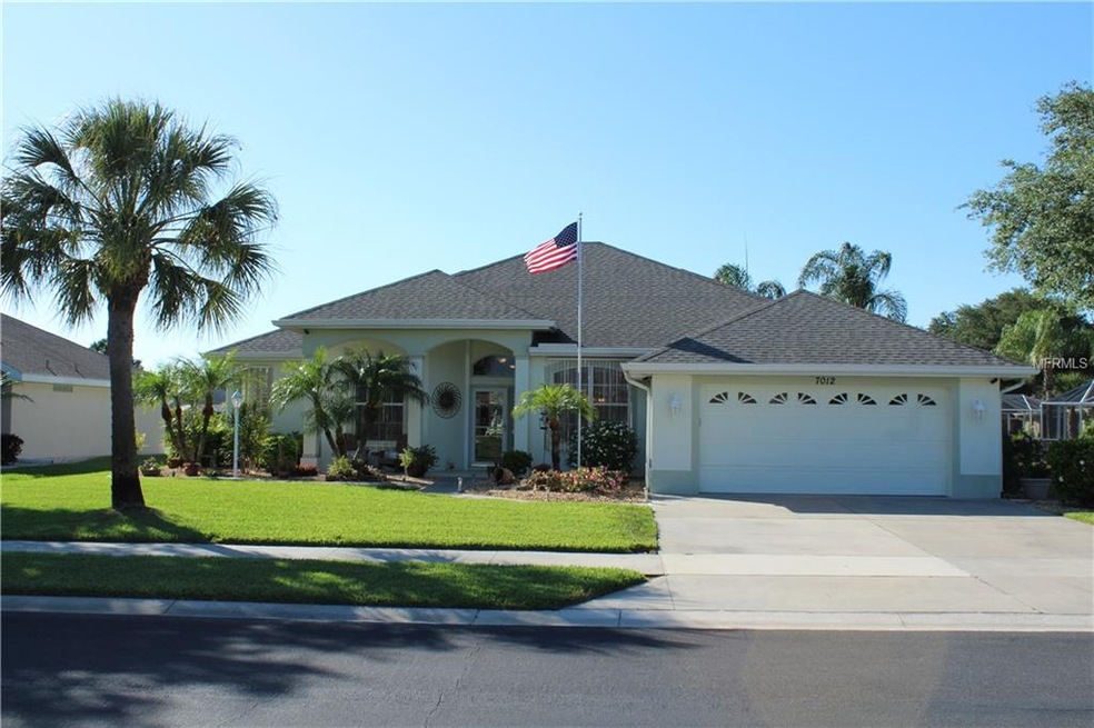 Front of this beautiful 4 bedroom 2 bath lakefront