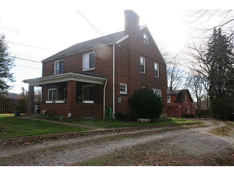 Exterior Front. two and half story all brick home 