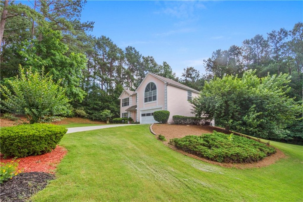 Beautifully landscaped lot - long driveway