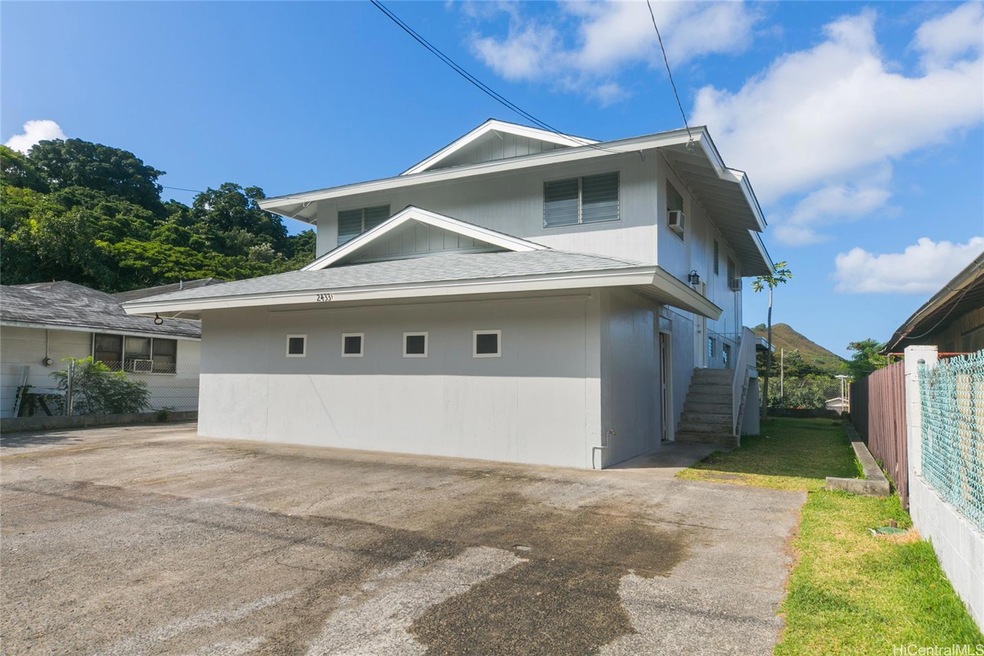 Front of home with five parking.  Newly painted. New roof.