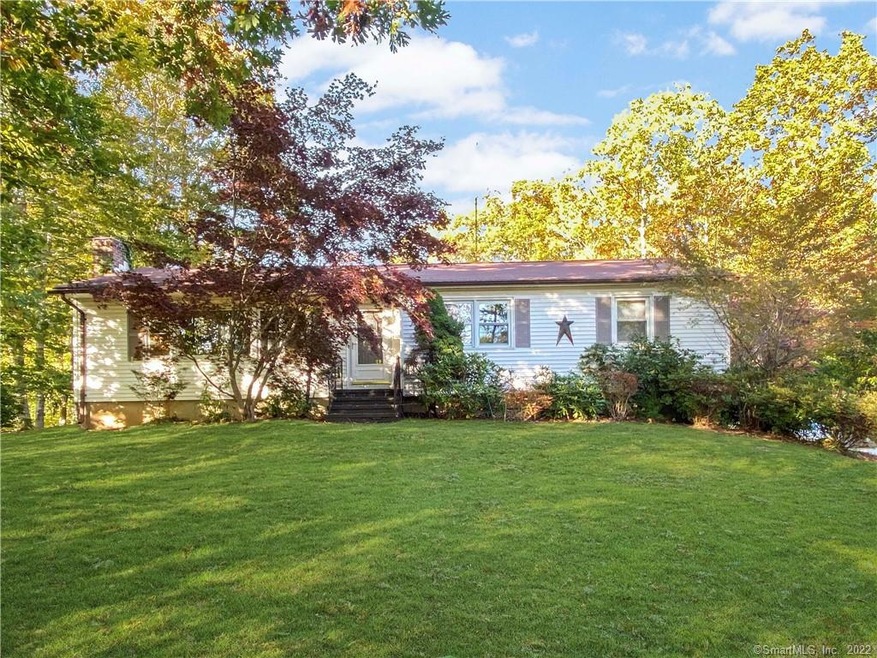 3 bedroom Ranch home on a level 1.97 acre lot