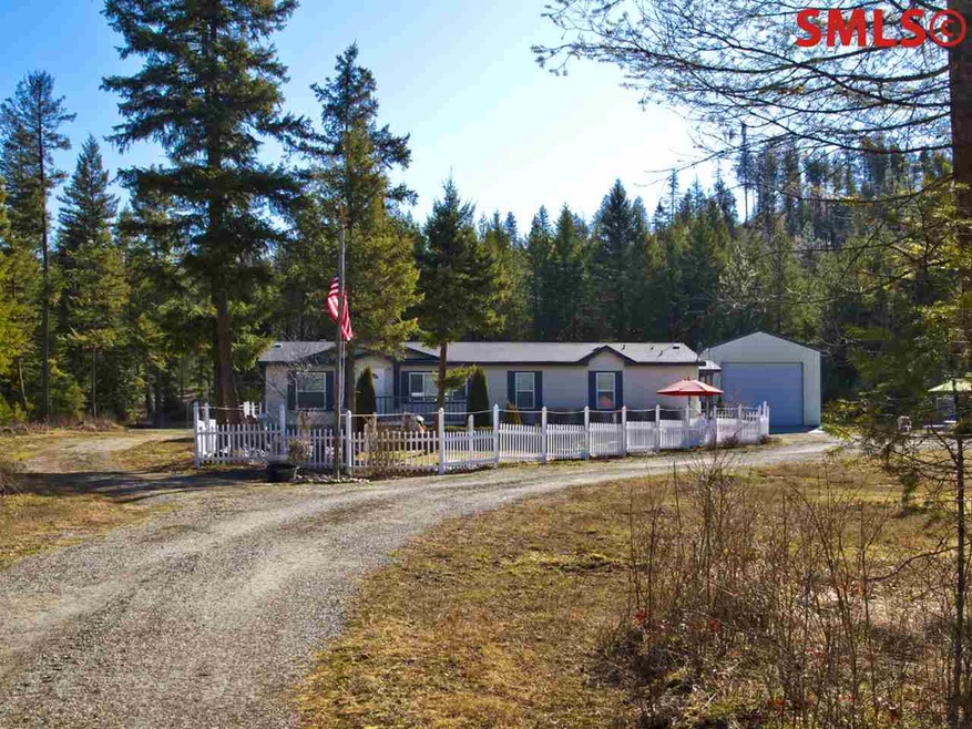 5 acres of groomed property. Shop and Garage