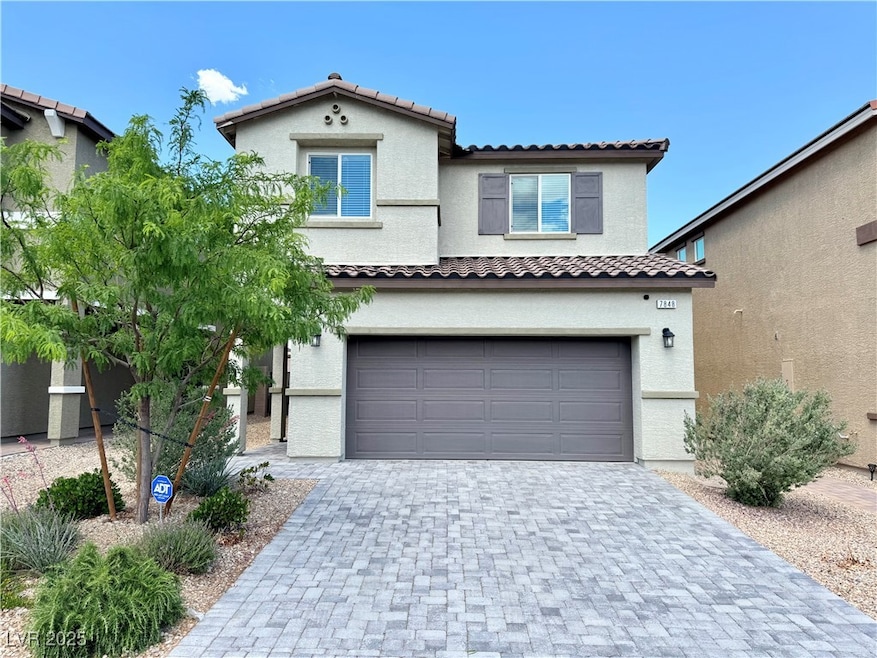 View of front of property with stucco siding, deco