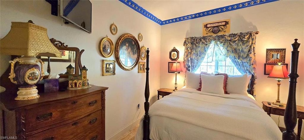 Bedroom featuring baseboards