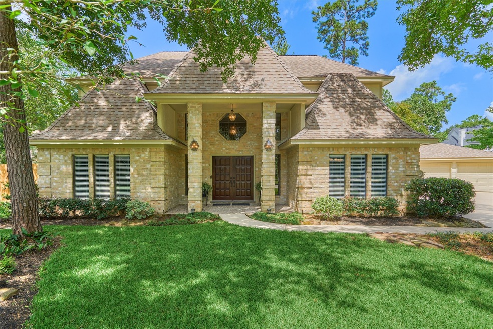 Grand entrance with large shaded front yard and be