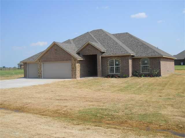 Exterior Front. Beautiful combo of stone & brick w