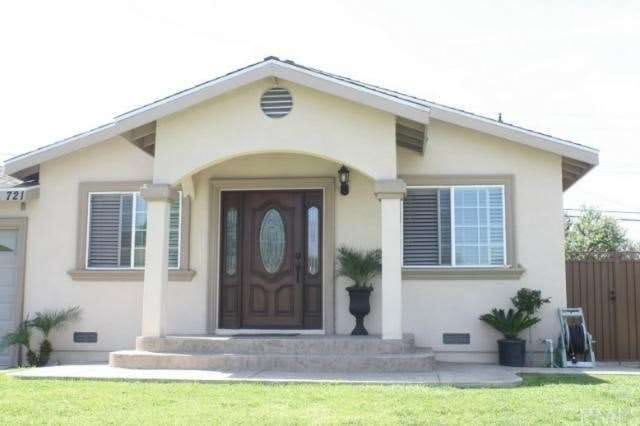 Newly remodeled La Puente home! Features landscaped front yard. New roof, windows, and exterior paint. 