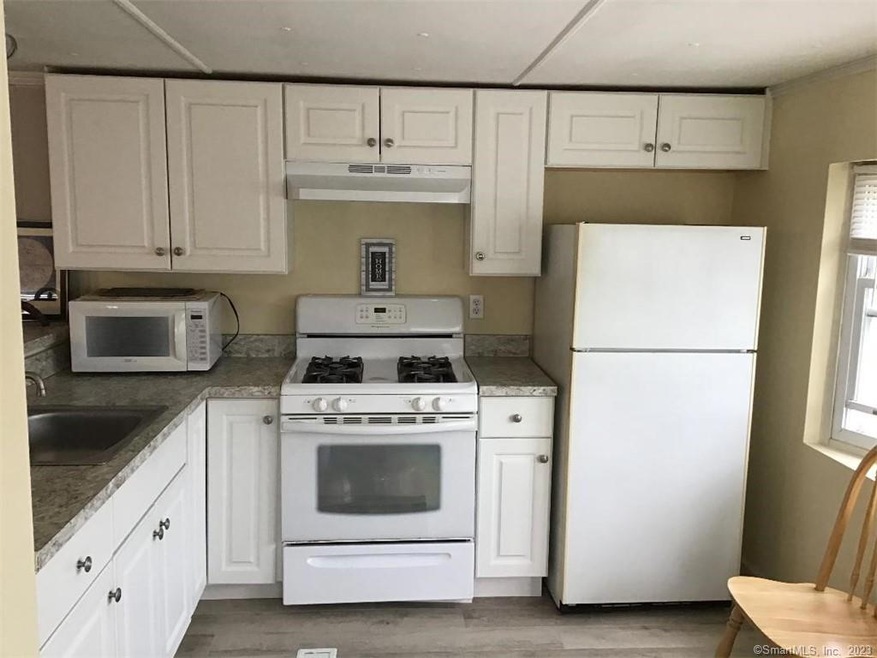 Kitchen w/ new white cabinets
