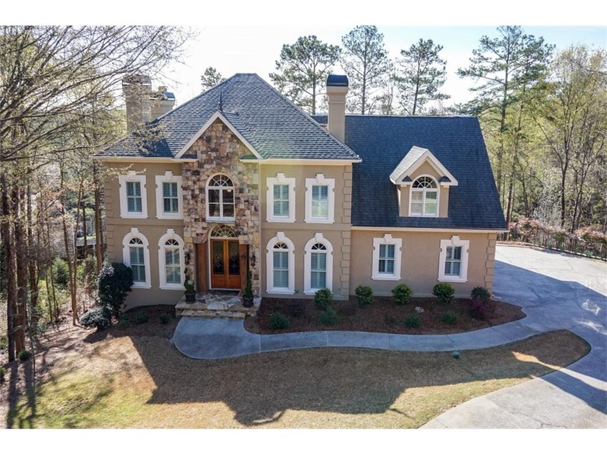 Incredible home features stone accents and hard co