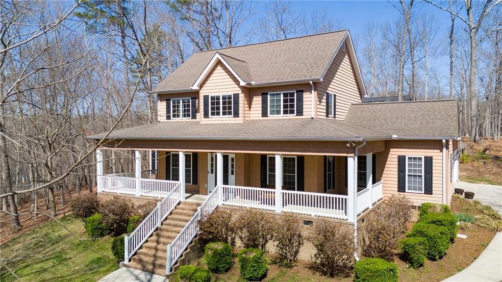 View of front of property featuring wrap around po
