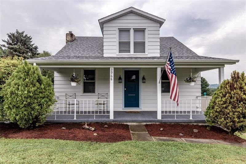 Adorable Cape with new roof, fresh landscaping, ne