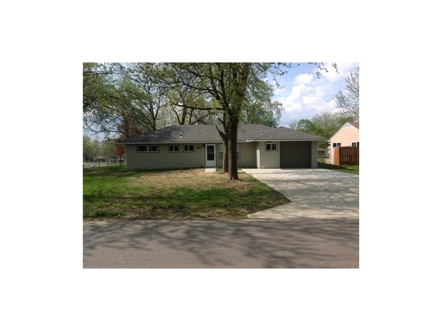 Front with New Driveway