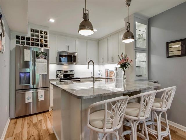 The kitchen which was recently renovated with quar