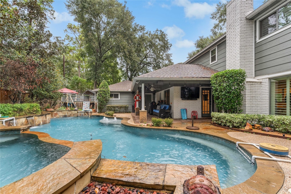 Experience resort-style living at home with the exquisite pool and spa, offering a serene retreat right in your own backyard, complete with lush landscaping and inviting waters.