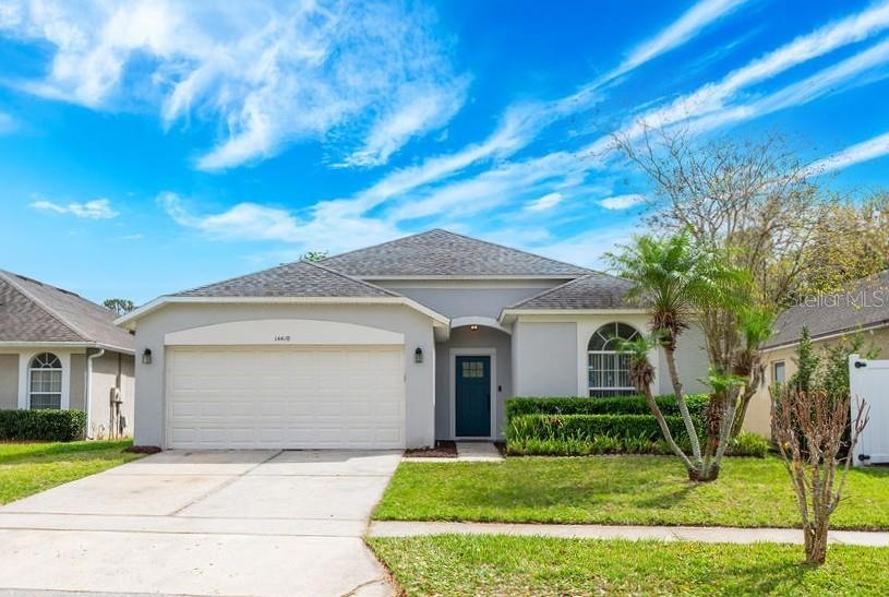3BD/2BA block home with a NEW TANKLESS WATER HEATER (2023), RENOVATED KITCHEN (2023), INTERIOR PAINT (2023), EXTERIOR PAINT (2020), a NEWER ROOF (2019) and UPDATED A/C (2017)!