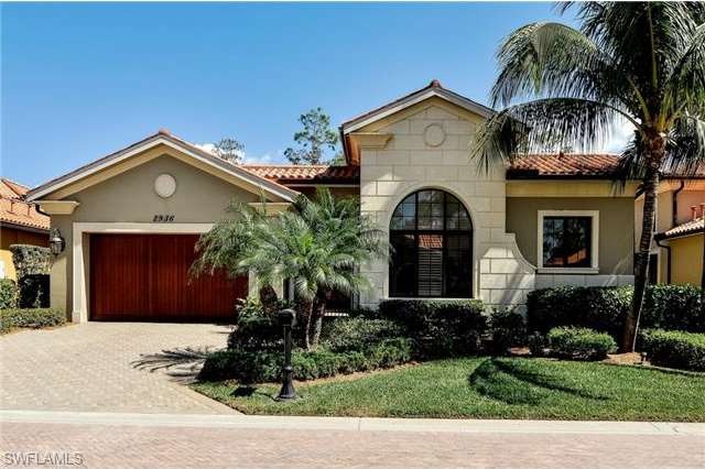 Front view of the home, professionally landscaped.