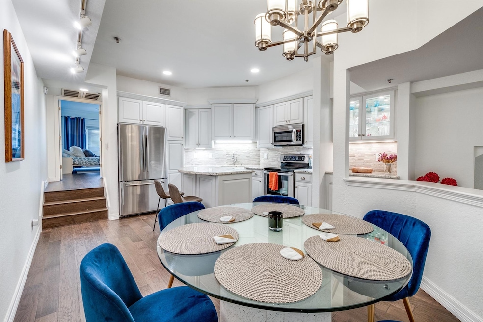 Dining area featuring sink, hardwood / wood-style 