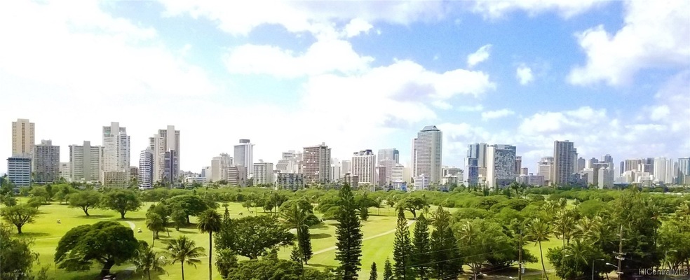 Beautiful golf course and cityscape views.