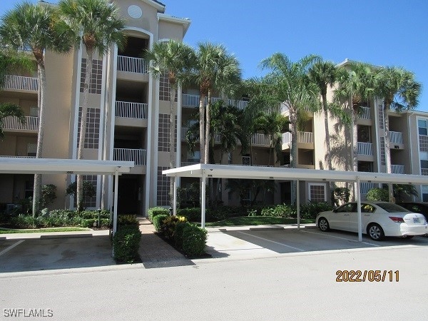 View of apartment building / complex featuring cov