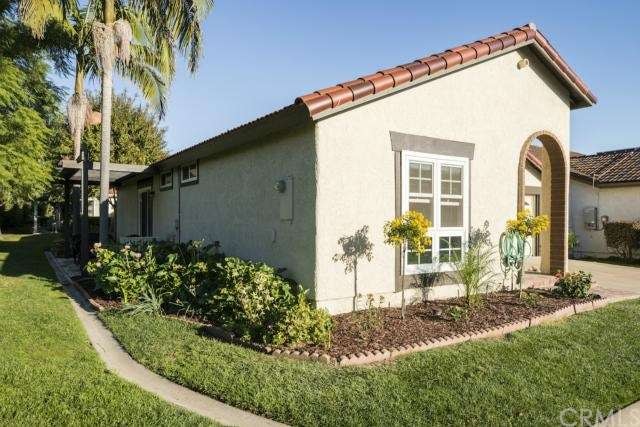 Front and side of home with lovely yards