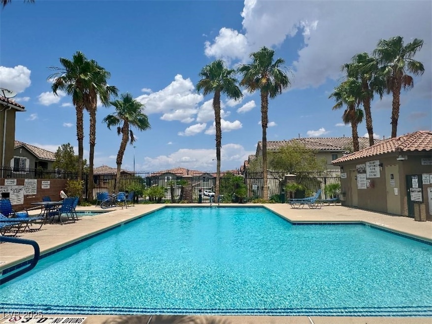 Community pool, palm trees and great views!