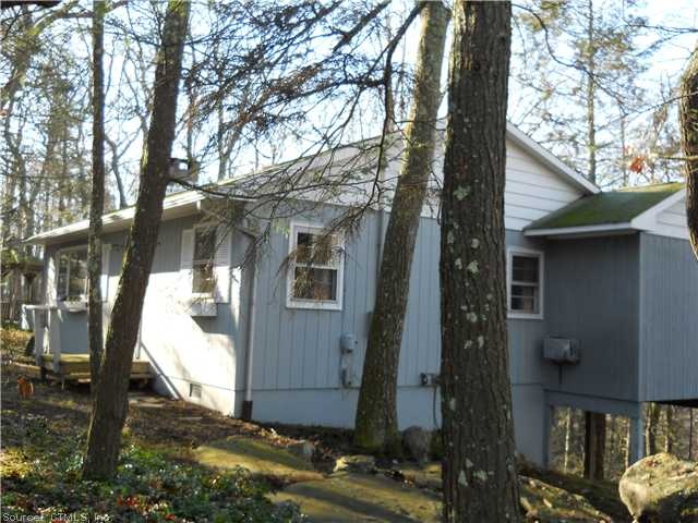 Exterior Front. HOUSE ON RIGHT COMING DOWN GREEN P