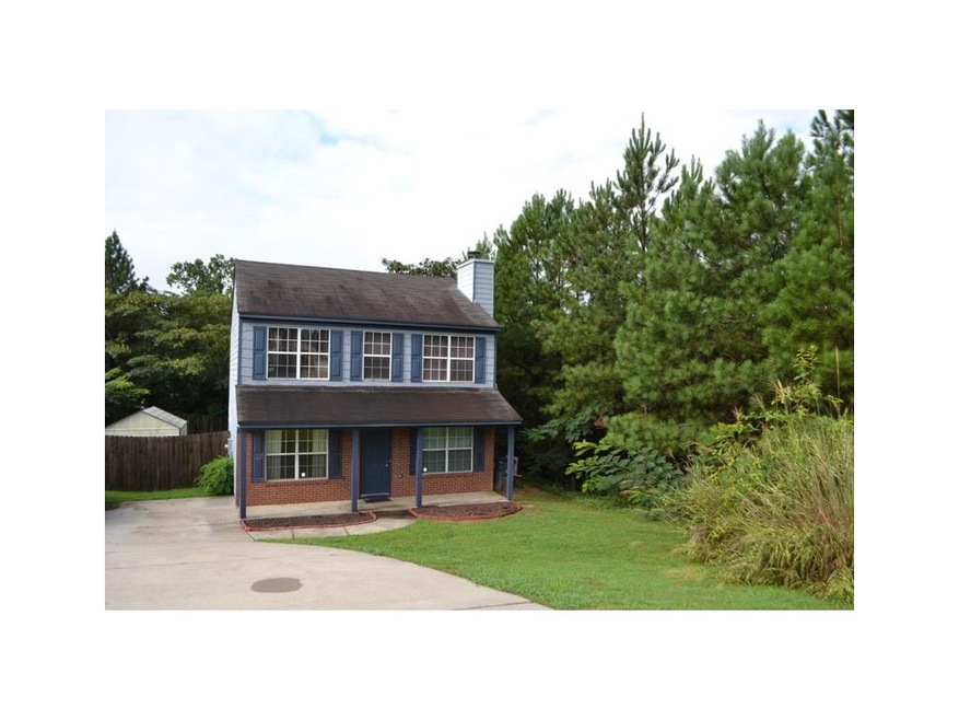 SPACIOUS HOME WITH FENCED YARD & OUTBUILDING!