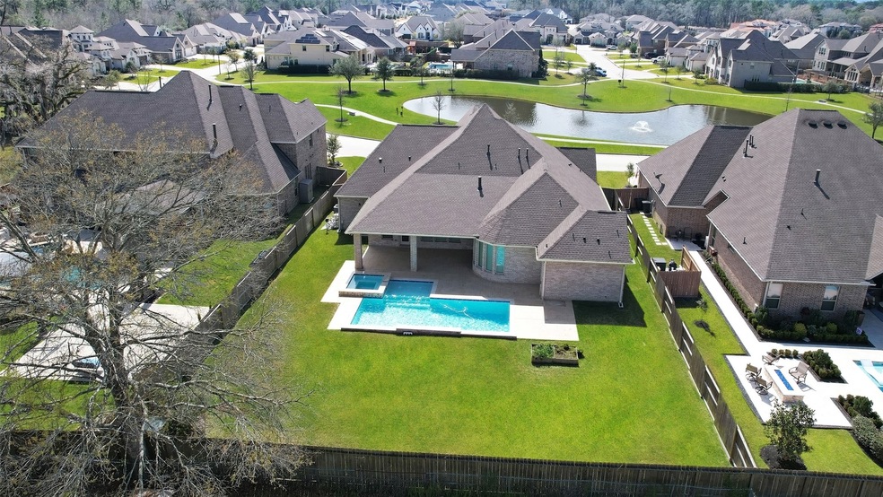 Welcome home to your beautiful ONE STORY residence located at 13614 E. Palomino in Cypress Texas. This home is inviting and loaded with attractive features. This view of the back of the residence shows the attention to size of the lot and detail of the home. LOCATION! LOCATION will not disappoint!
 Located in the coveted GATED COMMUNITY of BRIDLECREEK.